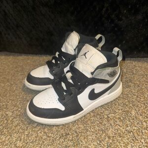 Jordan Kids Black and White High-Top Sneakers